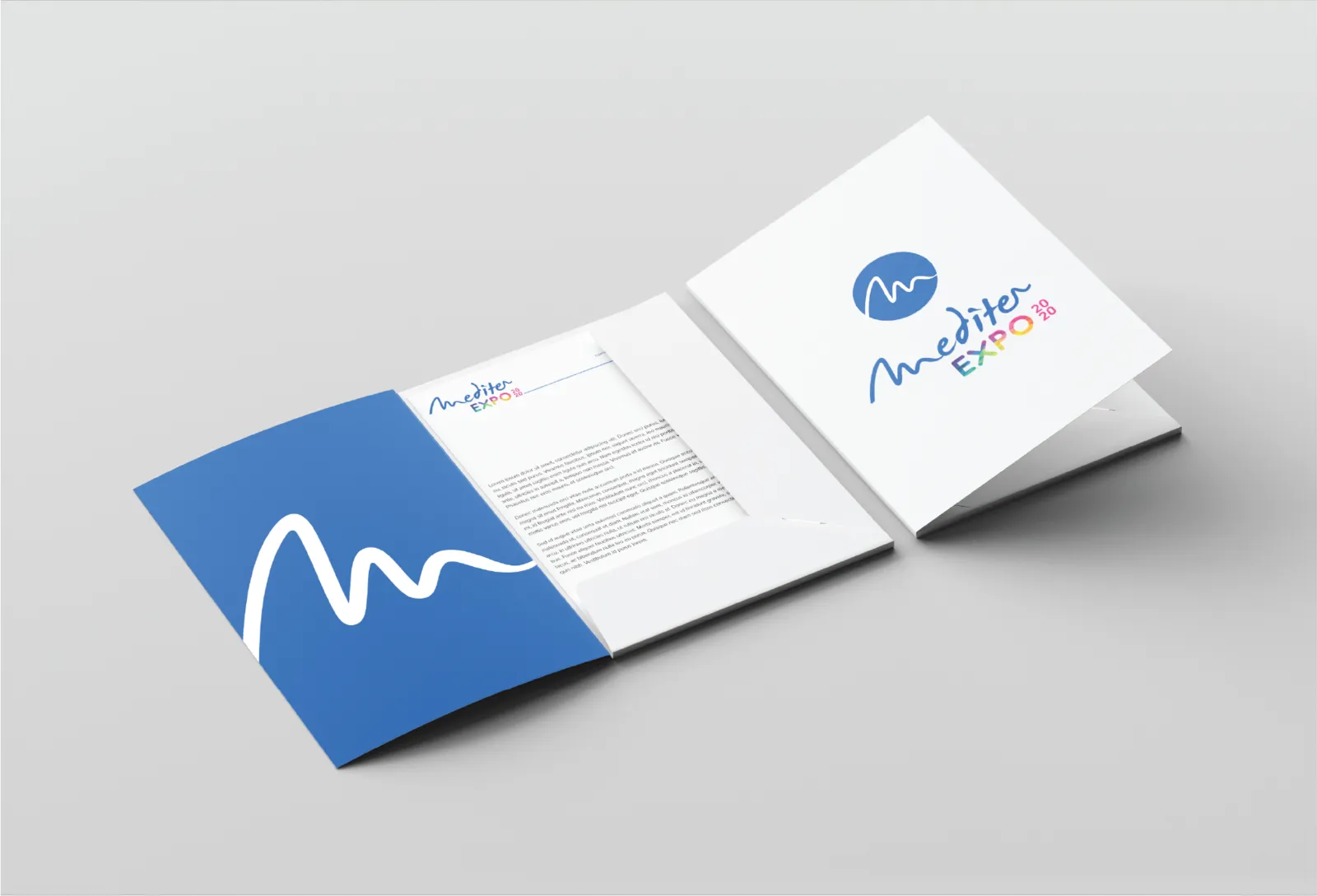 A Mediter Expo presentation folder with the blue wave